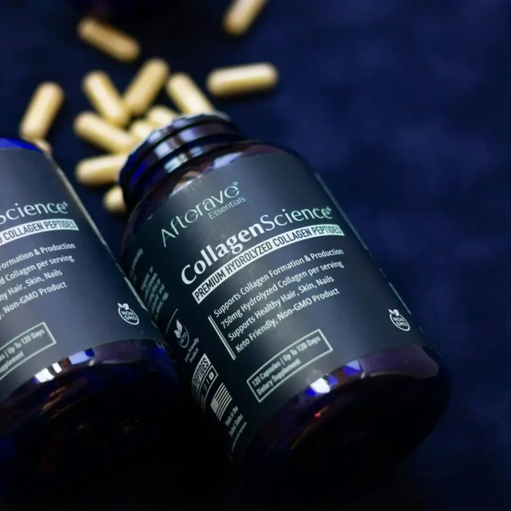 A close-up view of two dark blue bottles labeled "CollagenScience+ Premium Hydrolyzed Collagen Peptides" by Afterave Essentials, surrounded by yellow collagen capsules on a dark background