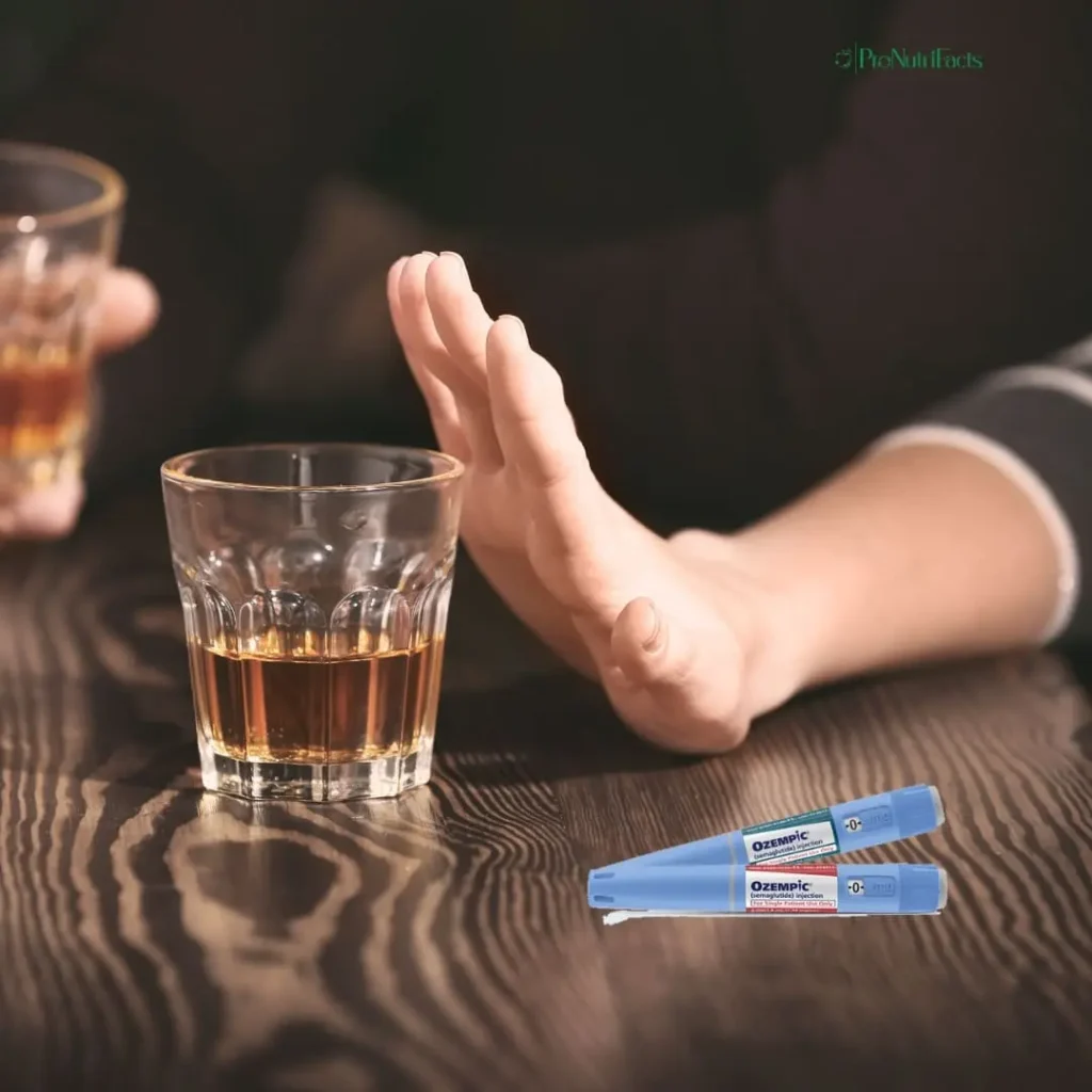 "Can You Drink Alcohol on Semaglutide for Weight Loss?" A person refuses a glass of whiskey, holding up their hand as a gesture of refusal. In the foreground, two Ozempic (Semaglutide) injection pens are placed on the table, reinforcing the topic of alcohol consumption while on weight loss medication.