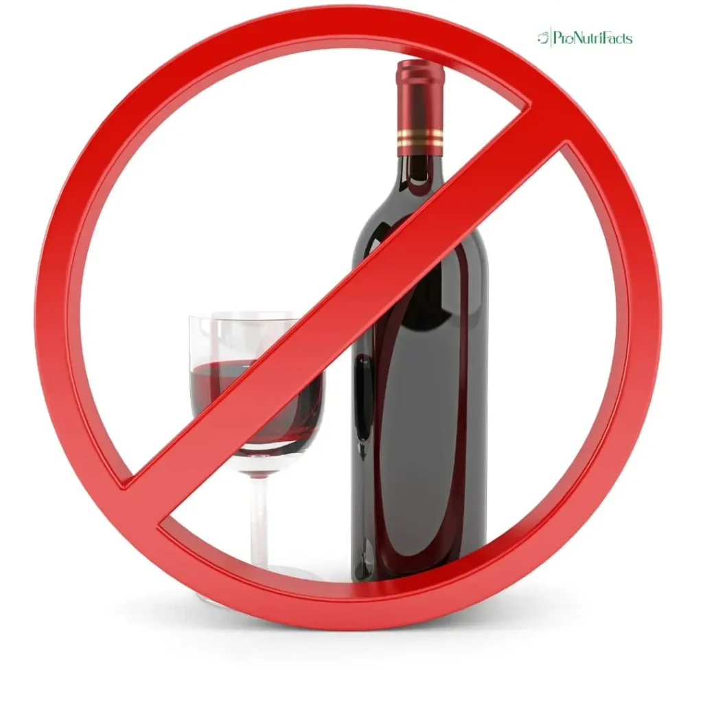 A bottle of red wine with a glass beside it, crossed out with a bold red prohibition sign, symbolizing restrictions on alcohol consumption. The image represents the idea of avoiding alcohol while on Semaglutide for weight loss.